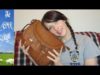 ASMR Whispering what’s in my bag / Purse